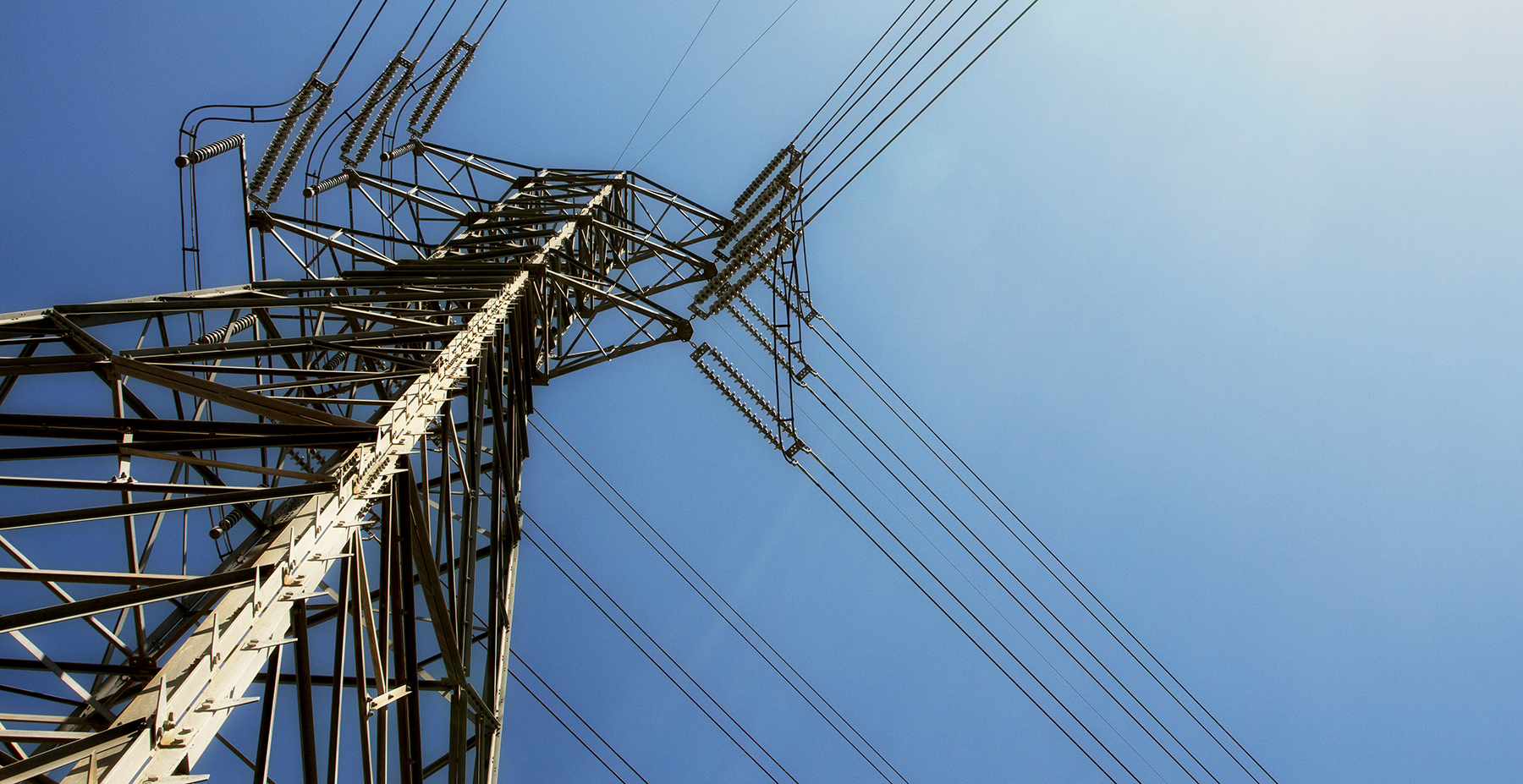 upward looking image of a power pole upward looking image of a power pole
