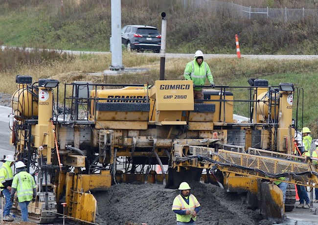 a crew works on a road project